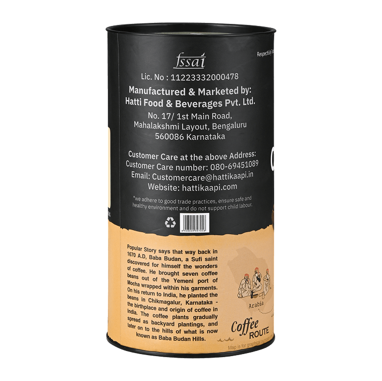 Back view of a cylindrical coffee packaging with text and branding on a black background
